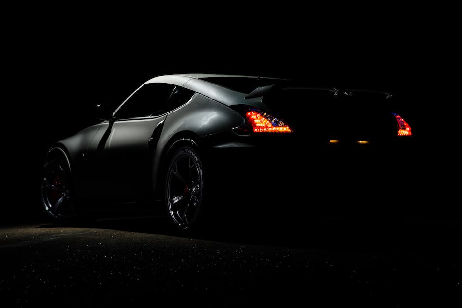 Revamp Your Car's Exterior: A Beginner's Guide Image of a car with pristine paintwork, shining under the sun